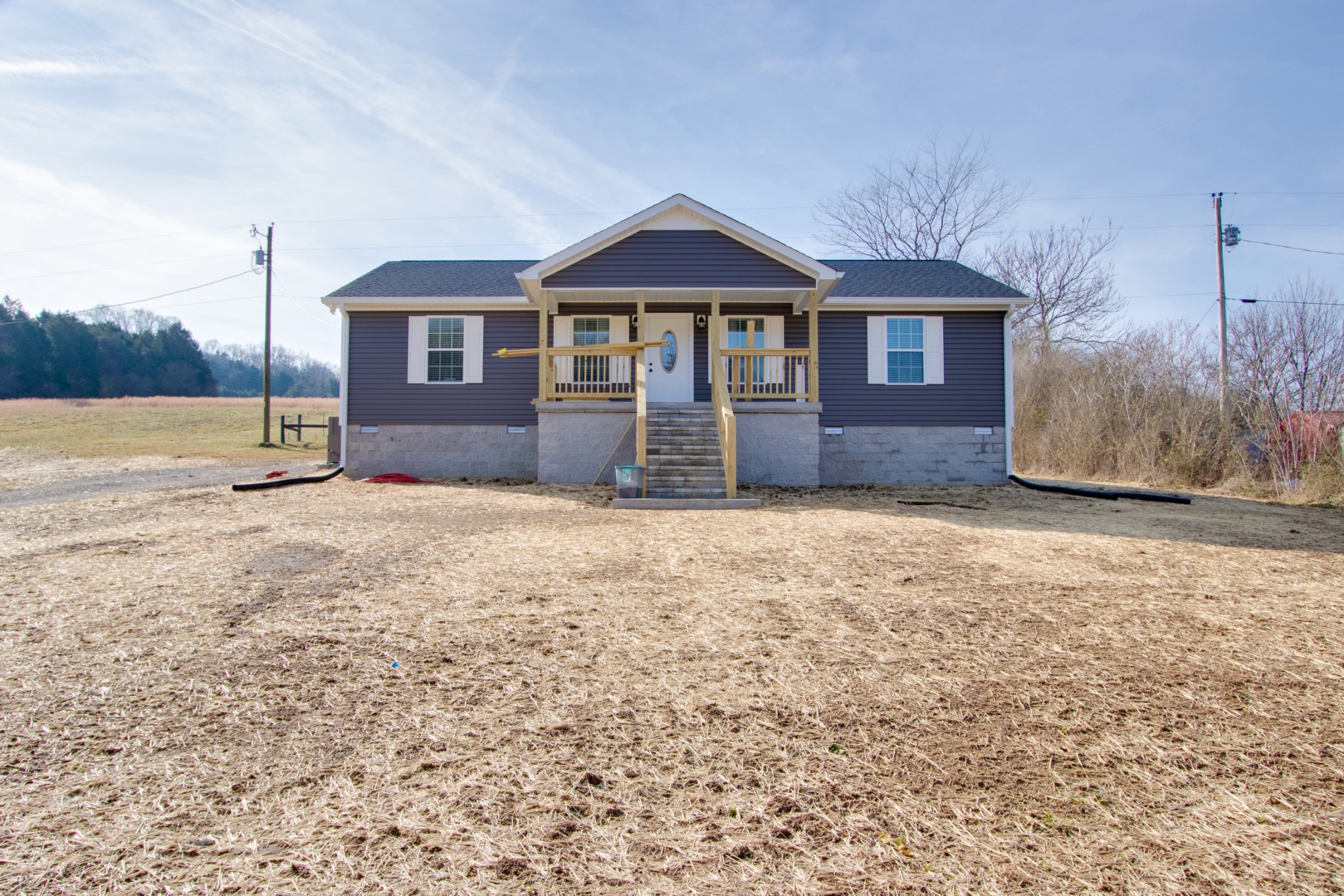 20 Young Road Buffalo Valley, TN 38548 - Photo 1 of 28 a front view of a house with a yard