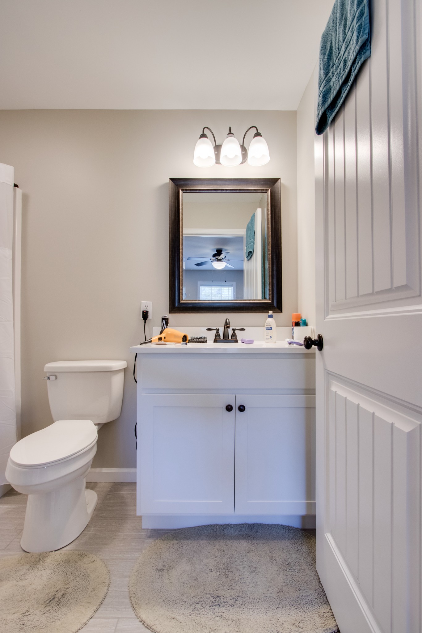 20 Young Road Buffalo Valley, TN 38548 - Photo 20 of 28 a bathroom with a sink mirror and toilet