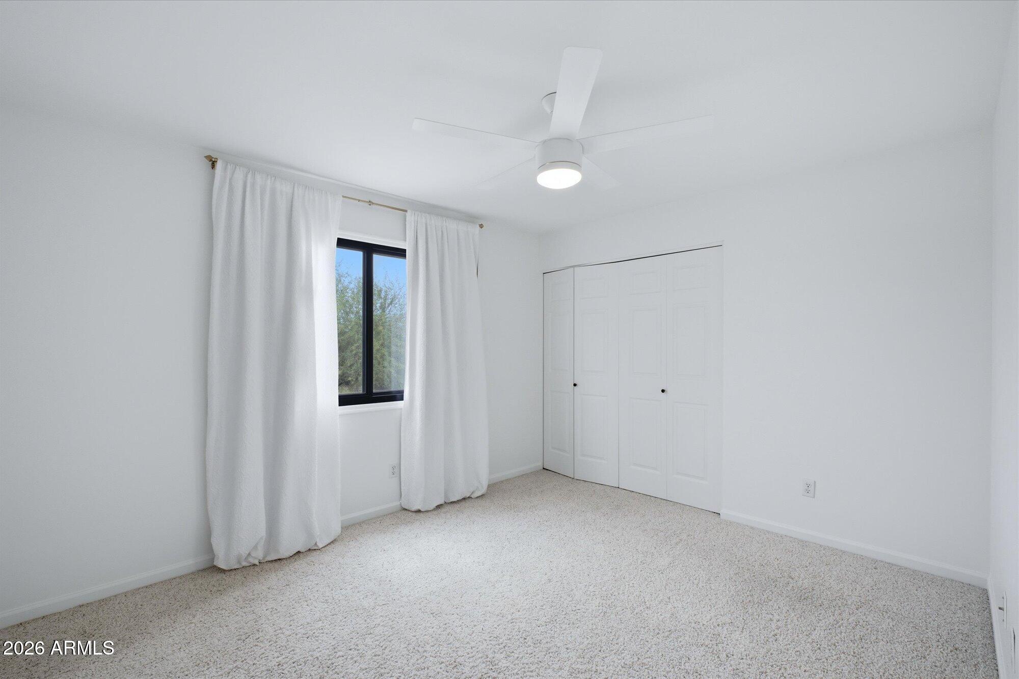405 East Marny Road Tempe, AZ 85288 - Photo 24 of 36 an empty room with windows