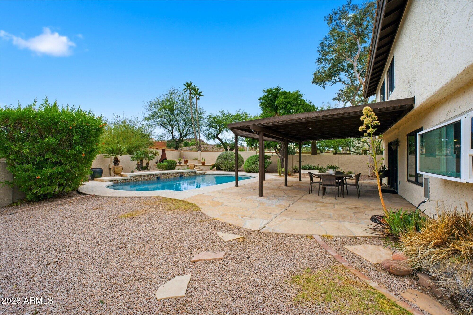 405 East Marny Road Tempe, AZ 85288 - Photo 28 of 36 a view of a backyard with sitting area
