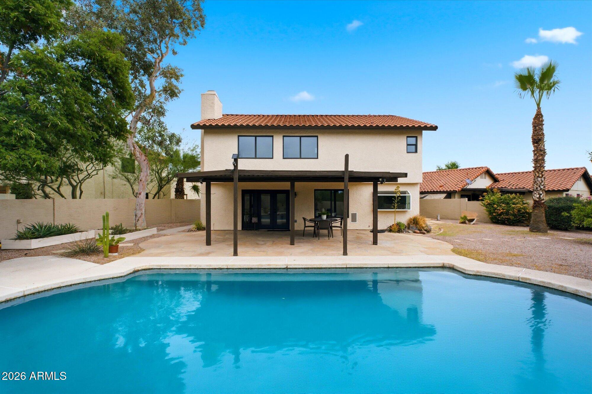 405 East Marny Road Tempe, AZ 85288 - Photo 31 of 36 a view of a house with pool and sitting area