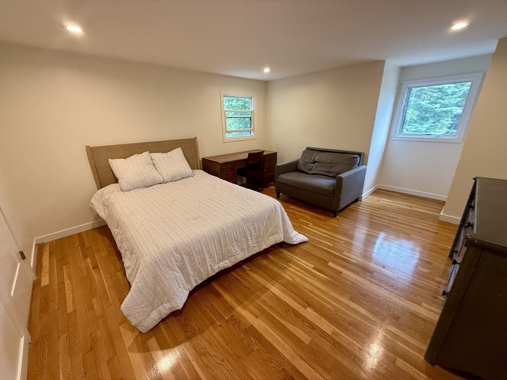 1 Maureen Road Lexington, MA 02420 - Photo 8 of 20 a bedroom with double bed and a window