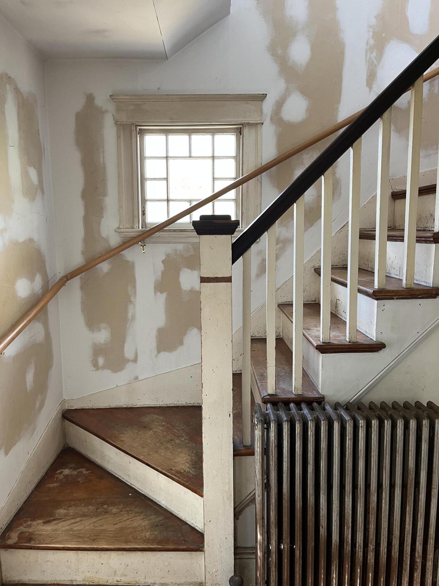 53 Mabel Street Portland, ME 04103 - Photo 12 of 16 newer drywall staircase