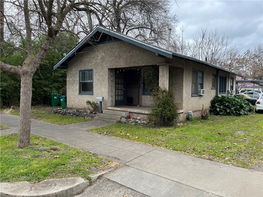 617 Orient Street Chico, CA 95928 - Photo 1 of 8 a front view of house with yard and green space