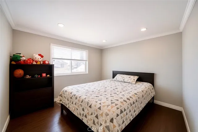 a bedroom with a bed and a closet