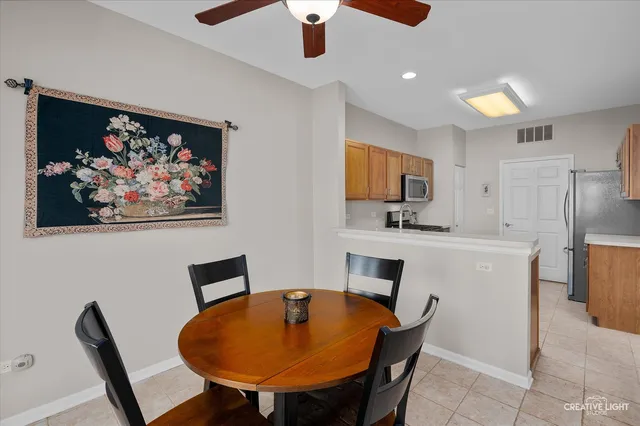 a view of kitchen with cabinets and wooden floor