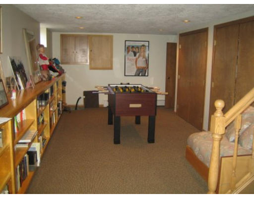 220 Ridgeway Road Weston, MA 02493 - Photo 11 of 12 a view of a livingroom with furniture and a couch