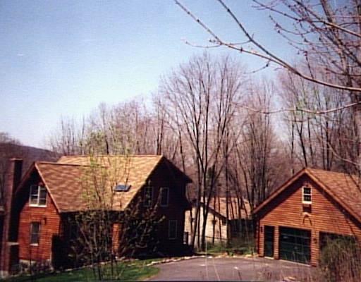 48 Taylor Road Bethel, CT 06801 - Photo 1 of 1 a front view of a house with a yard