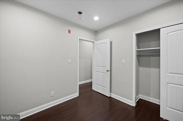 a workspace with furniture and wooden floor