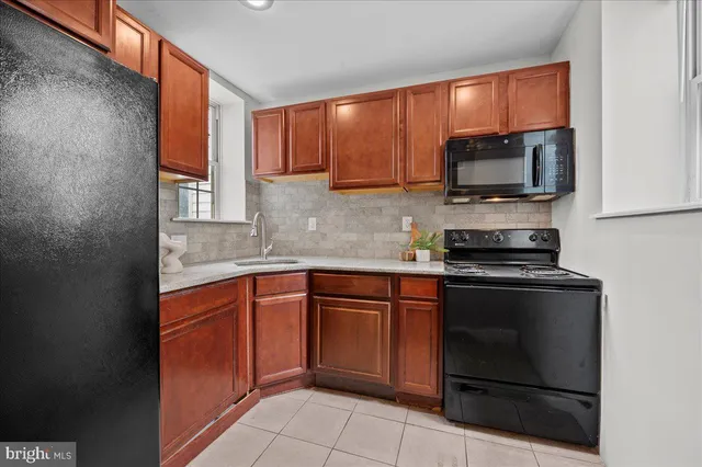 a bathroom with a sink toilet and bathtub