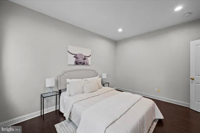 a kitchen with stainless steel appliances kitchen island granite countertop a sink and cabinets