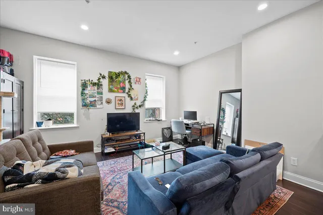 a living room with furniture and a couch