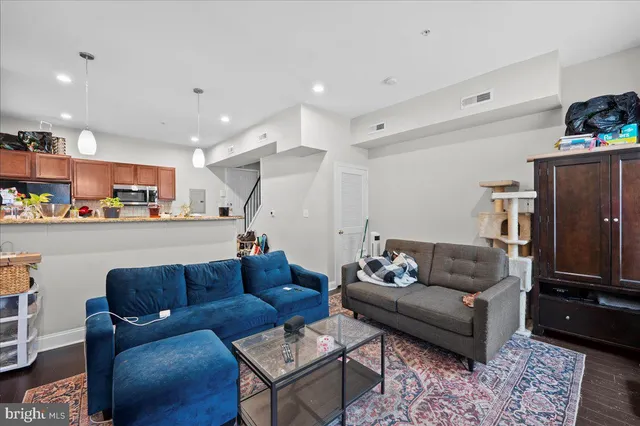 a bedroom with a bed and a flat screen television