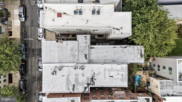 a aerial view with streets and trees