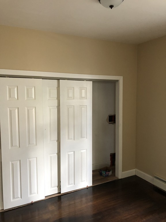 289 Warren Street Fall River, MA 02721 - Photo 4 of 11 a view of wooden floor with entryway