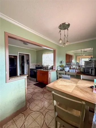 a view of kitchen with breakfast area