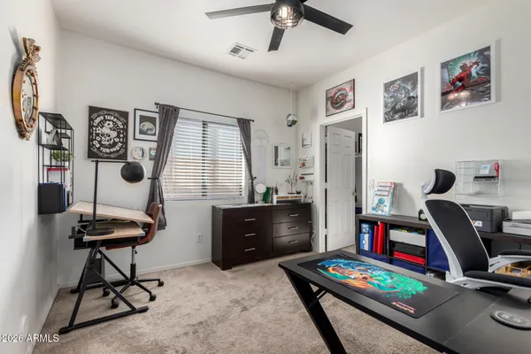 a workspace with furniture and window