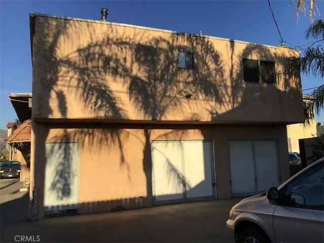 a view of swimming pool from a balcony