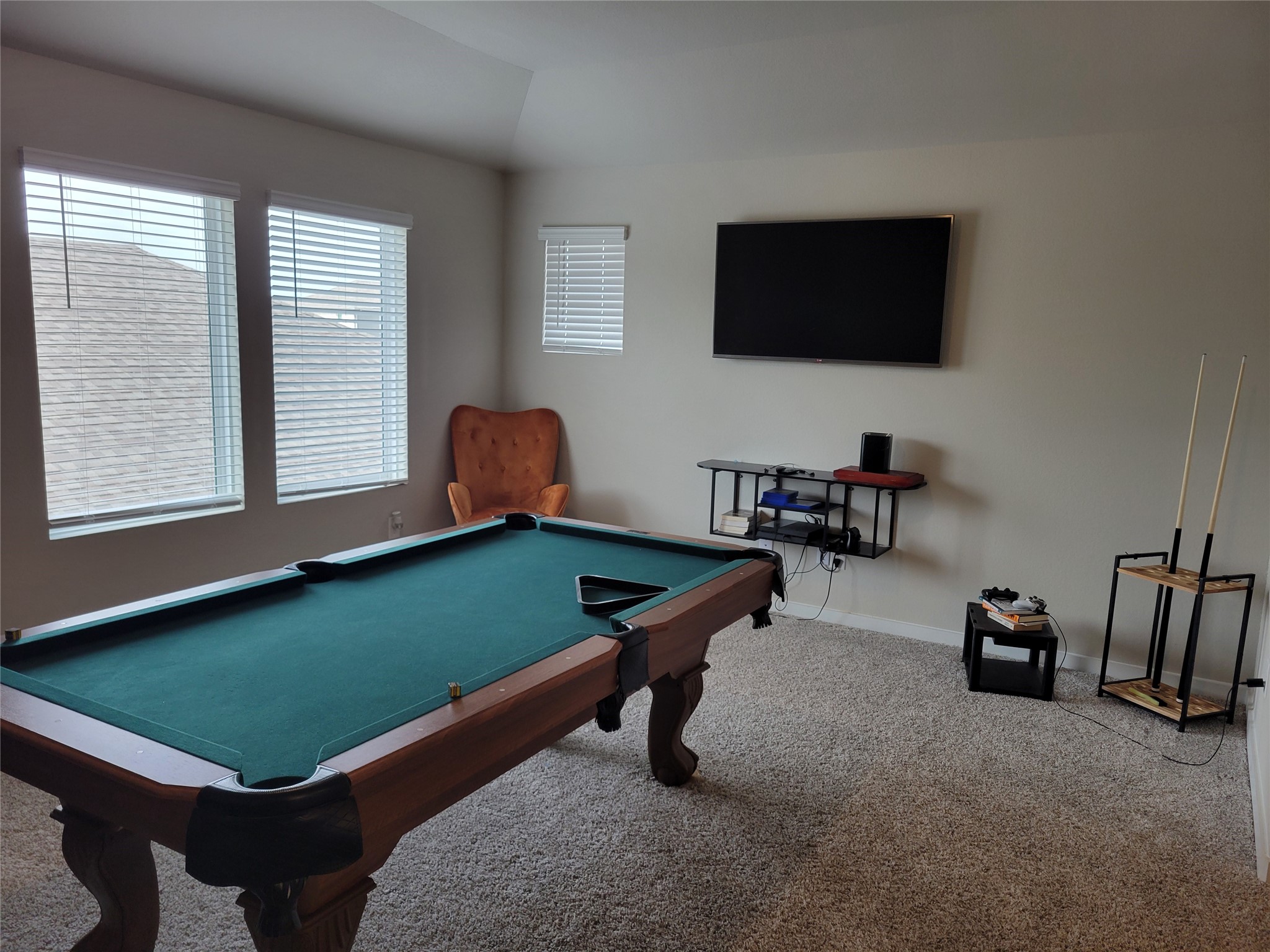 2607 Homestead Rnch Lane Crosby, TX 77532 - Photo 12 of 17 The expansive gameroom is ready for movie nights, friendly competition....