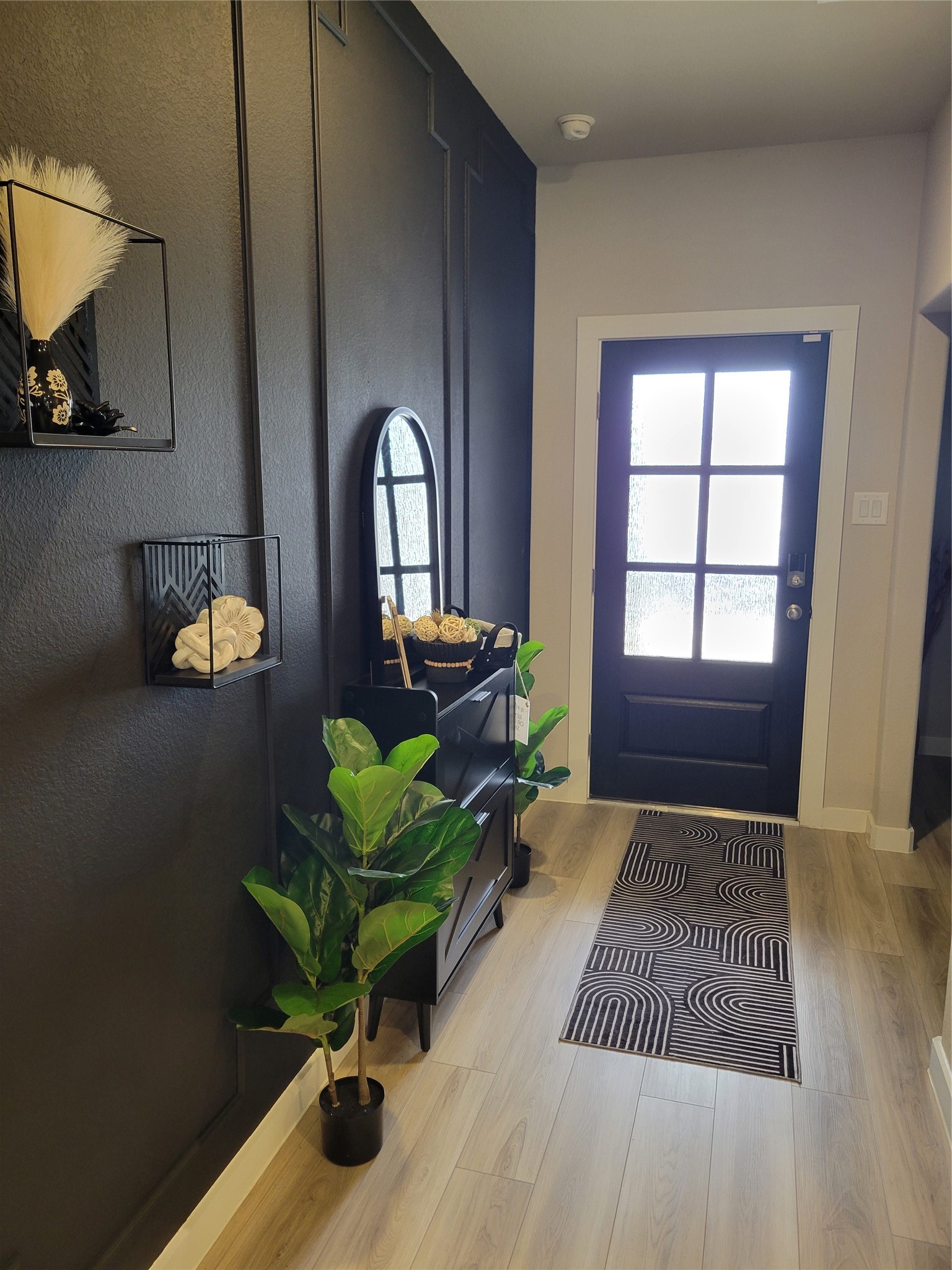 2607 Homestead Rnch Lane Crosby, TX 77532 - Photo 2 of 17 Sunlight pours through the 3-lite door, offering a warm welcome before you even step inside