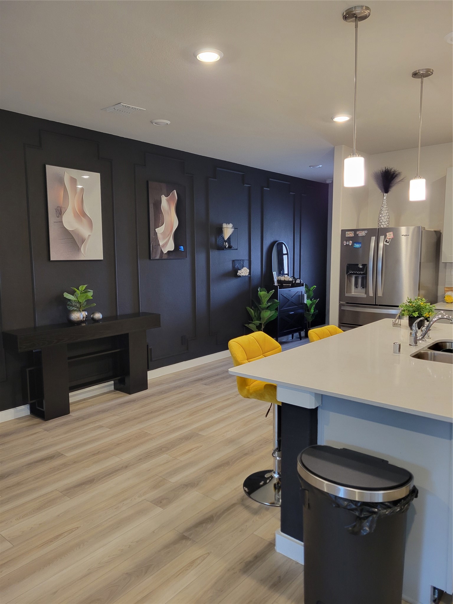 2607 Homestead Rnch Lane Crosby, TX 77532 - Photo 3 of 17 A soaring ceiling and striking accent wall create a grand first impression that feels both elegant and inviting.