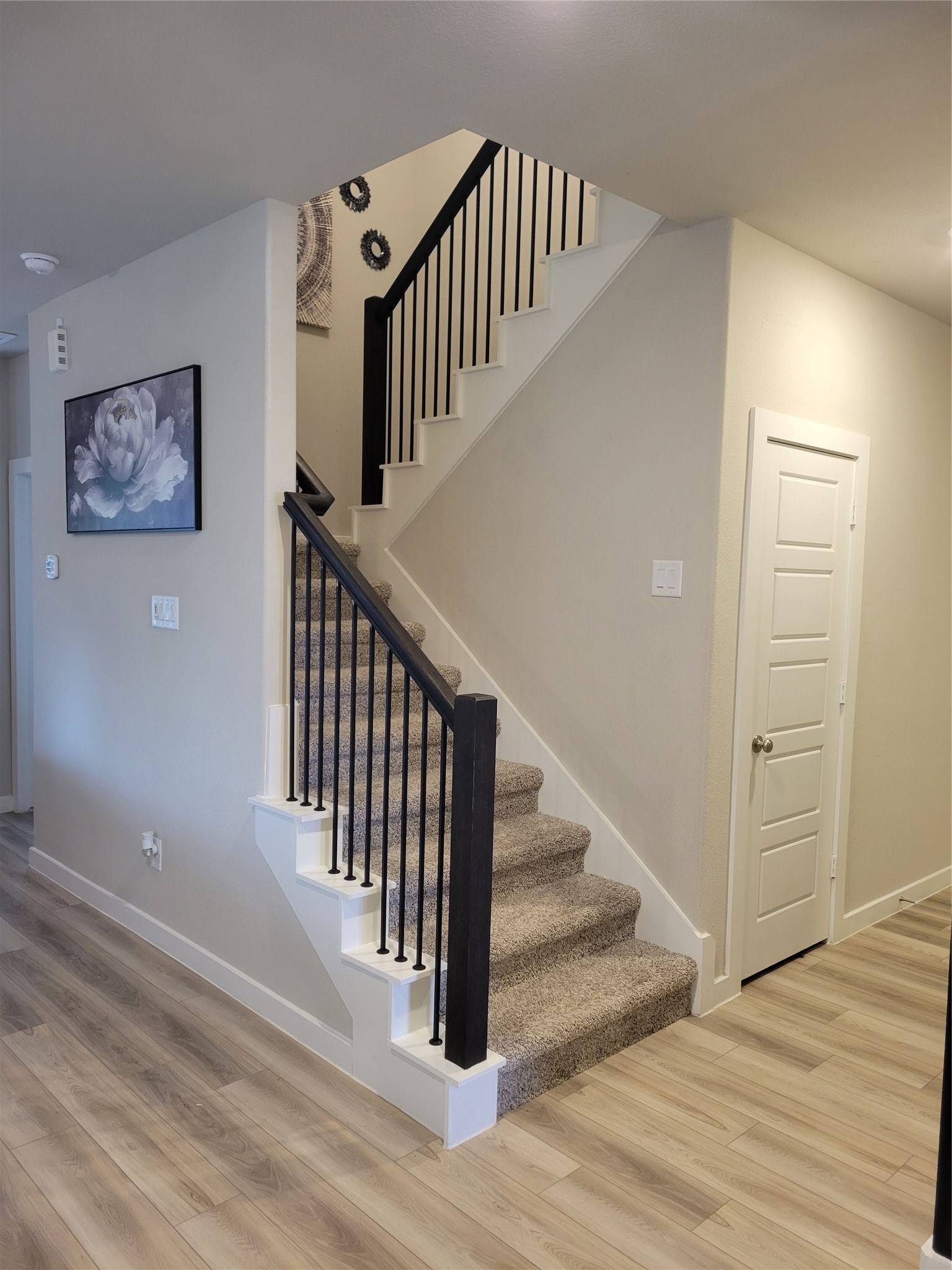 2607 Homestead Rnch Lane Crosby, TX 77532 - Photo 7 of 17 The wrought iron staircase rises gracefully beside the family room...