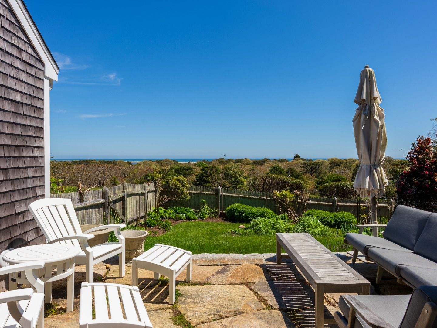 6 Wakeman Road Chilmark, MA 02535 - Photo 23 of 51 Private patio off of the primary bedroom with broad ocean views.