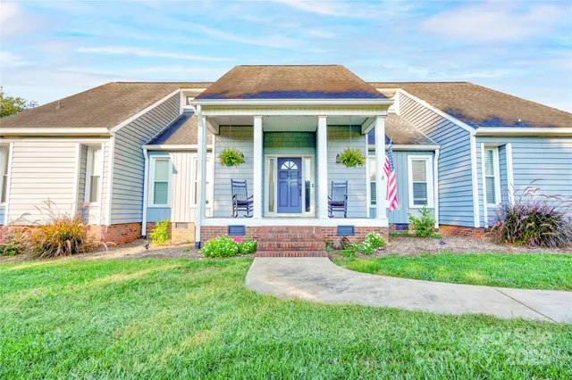 front view of a house with a yard