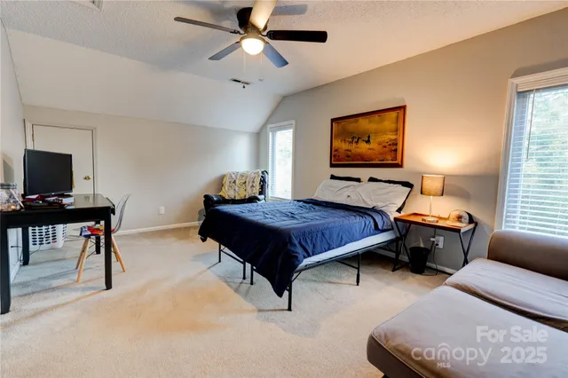 a room with furniture and air hockey table