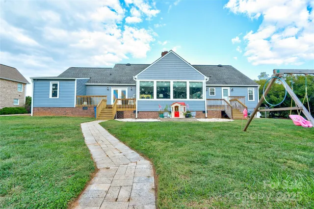 a front view of house with yard and porch