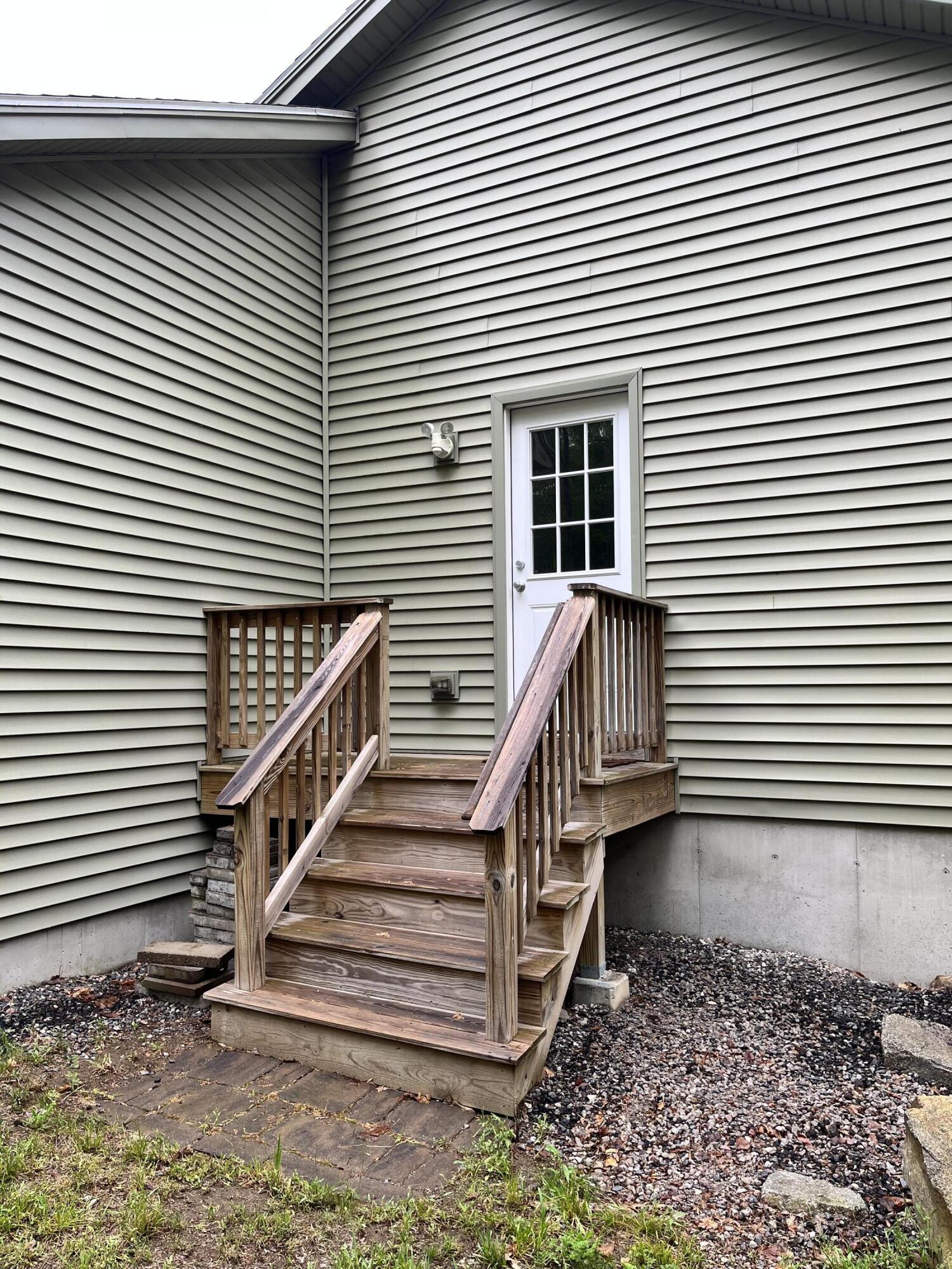 661 Tatnic Road Wells, ME 04090 - Photo 55 of 59 Exterior side hallway entrance