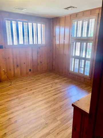 a view of wooden floor and staircase