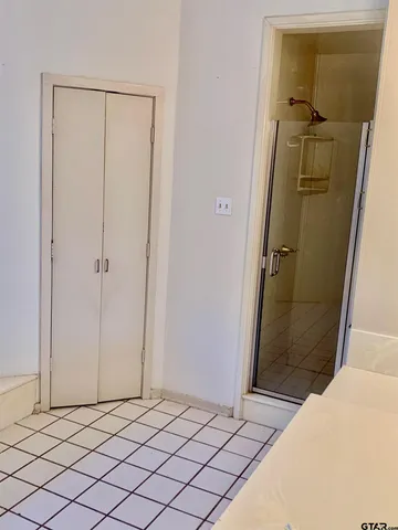 a white bath tub sitting next to a window