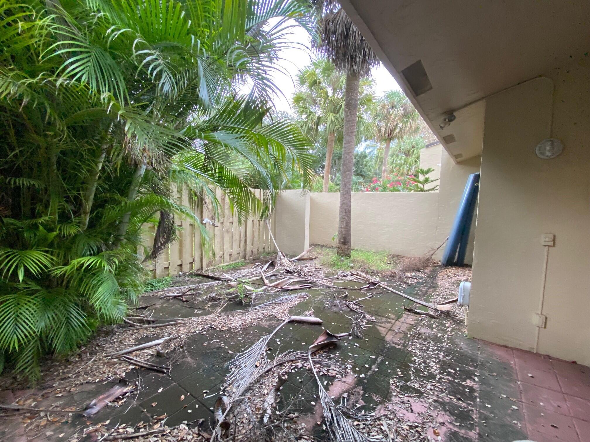 1400 Northwest 9th Avenue, Unit B8 Boca Raton, FL 33486 - Photo 24 of 26 Rear courtyard