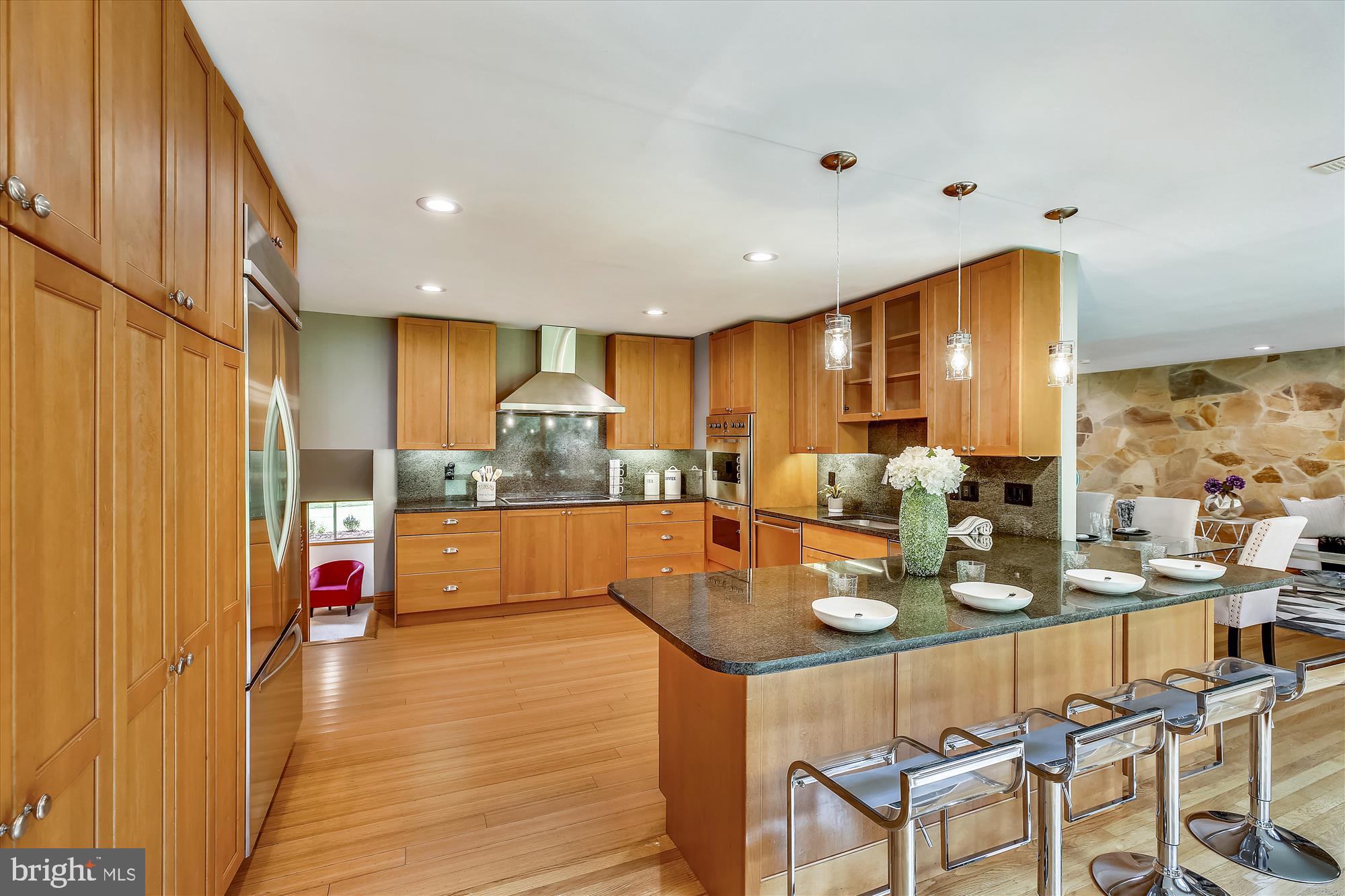 607 Stonington Road Silver Spring, MD 20902 - Photo 14 of 48 Kitchen w/ Bar Stool Island