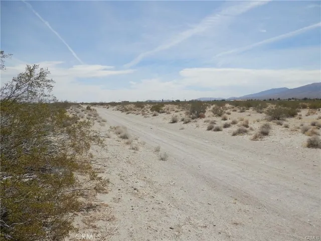a view of beach and lake