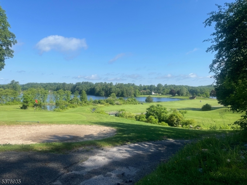 260 Old Chimney Ridge Road Montague, NJ 07827 - Photo 3 of 5 a view of a grassy field with trees