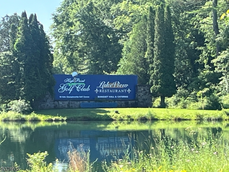 260 Old Chimney Ridge Road Montague, NJ 07827 - Photo 5 of 5 a view of swimming pool with a yard and sitting area