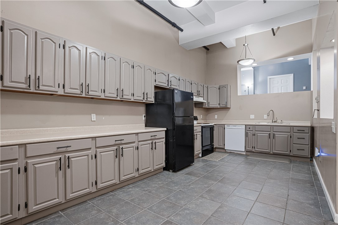 148 Bernon Street, Unit 7 Woonsocket, RI 02895 - Photo 5 of 49 Massive Kitchen with plenty of room for a breakfast table, island on wheels, and tons of storage and prep space