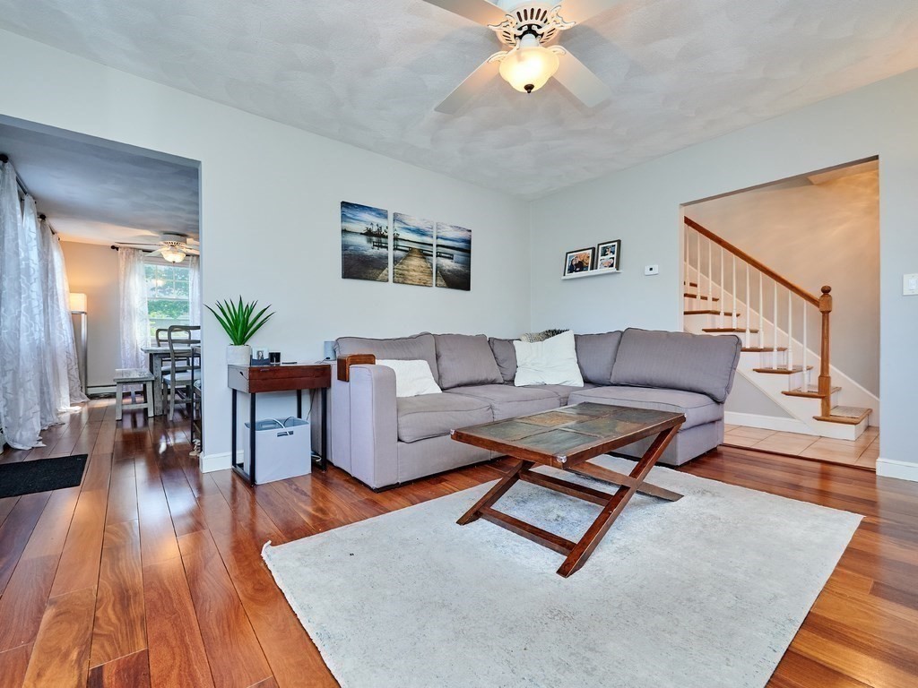 14 Hanson Street Wakefield, MA 01880 - Photo 18 of 32 a living room with furniture and wooden floor