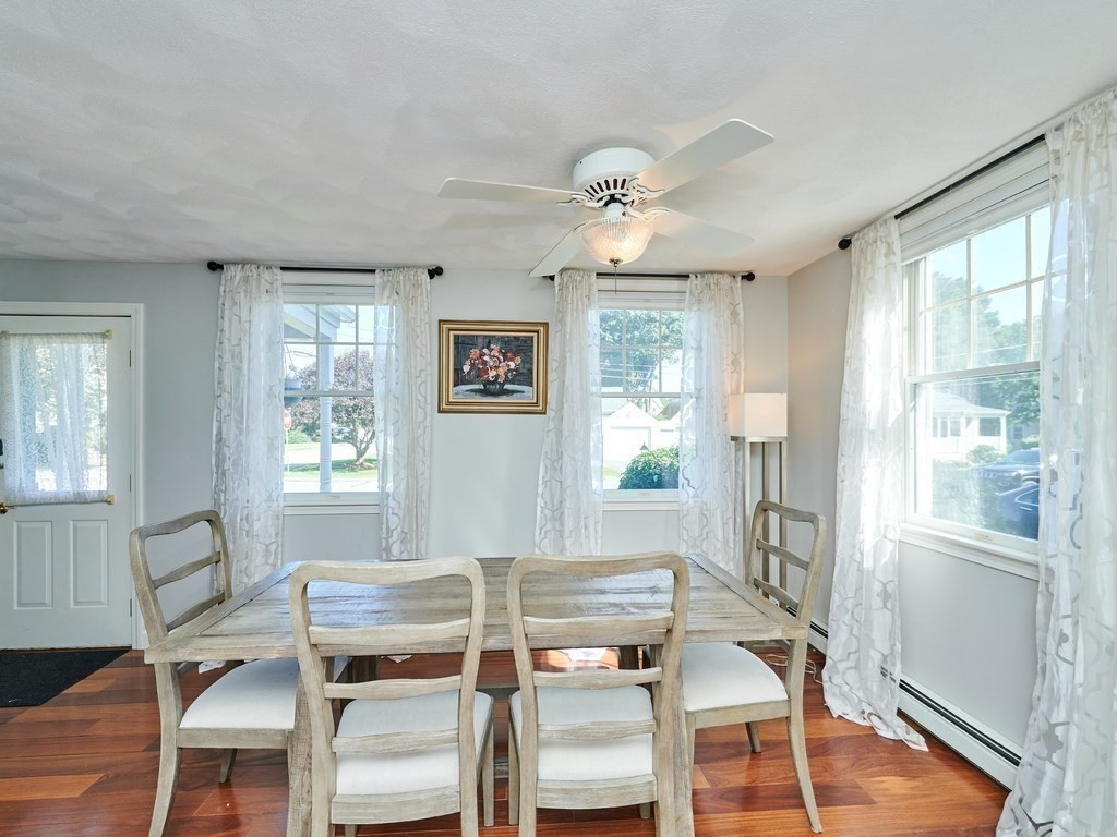 14 Hanson Street Wakefield, MA 01880 - Photo 20 of 32 a view of a dining room with furniture window and wooden floor