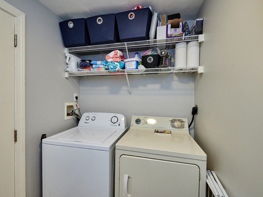 14 Hanson Street Wakefield, MA 01880 - Photo 27 of 32 a utility room with dryer and washer