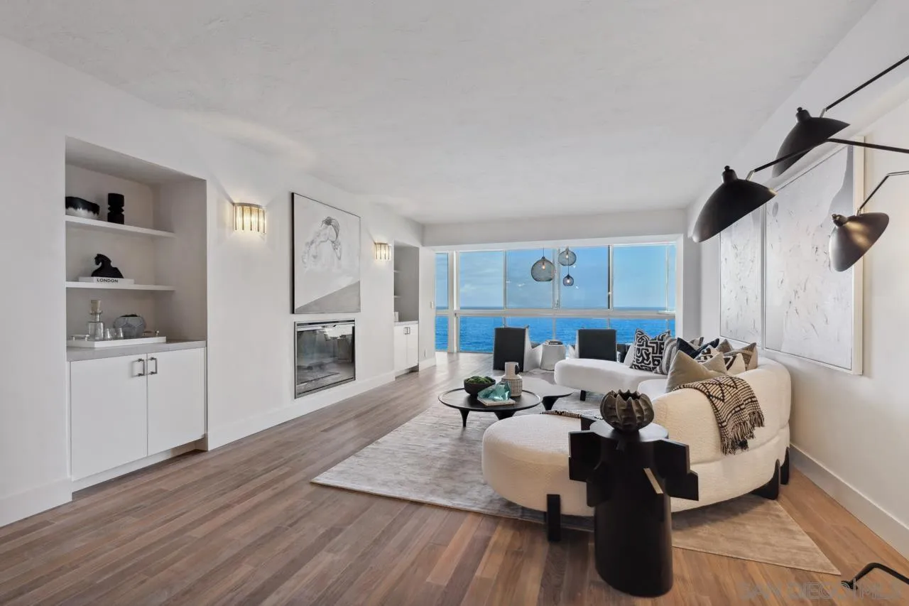 939 Coast Boulevard, Unit 12C La Jolla, CA 92037 - Photo 15 of 41 a living room with furniture fireplace and a window