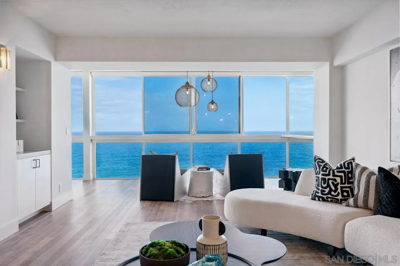 939 Coast Boulevard, Unit 12C La Jolla, CA 92037 - Photo 21 of 41 a living room with furniture and wooden floor