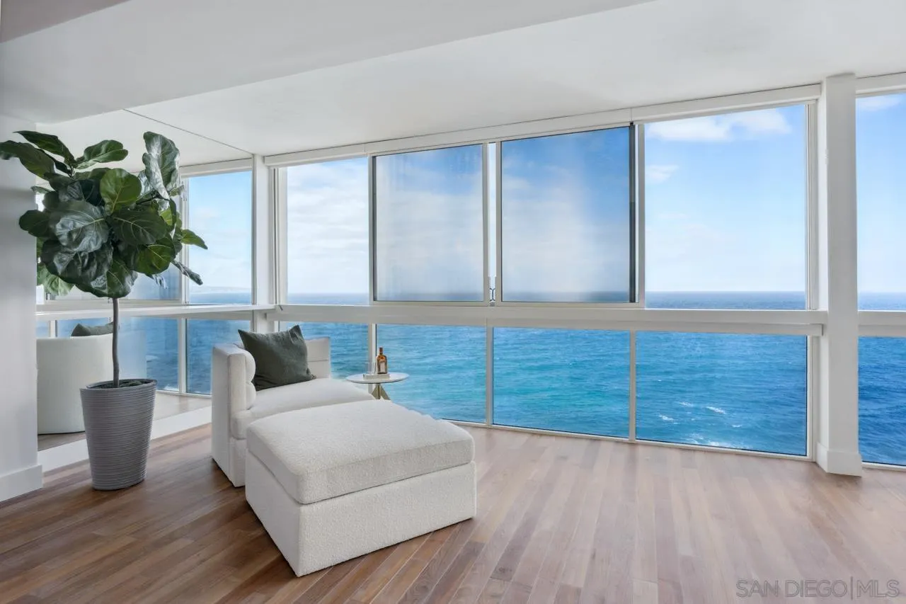939 Coast Boulevard, Unit 12C La Jolla, CA 92037 - Photo 28 of 41 a living room with furniture and a potted plant