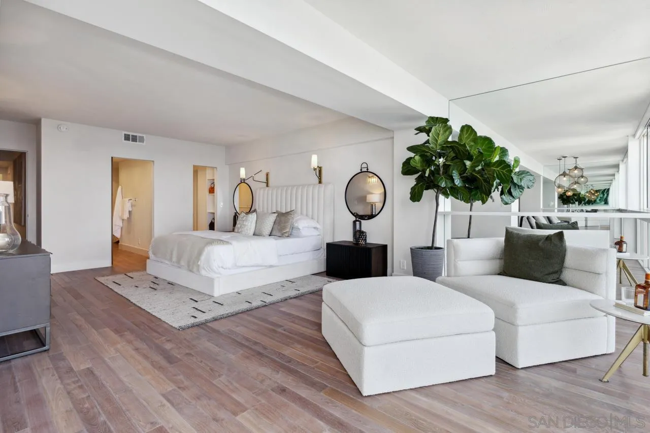 939 Coast Boulevard, Unit 12C La Jolla, CA 92037 - Photo 29 of 41 a living room with furniture and a clock