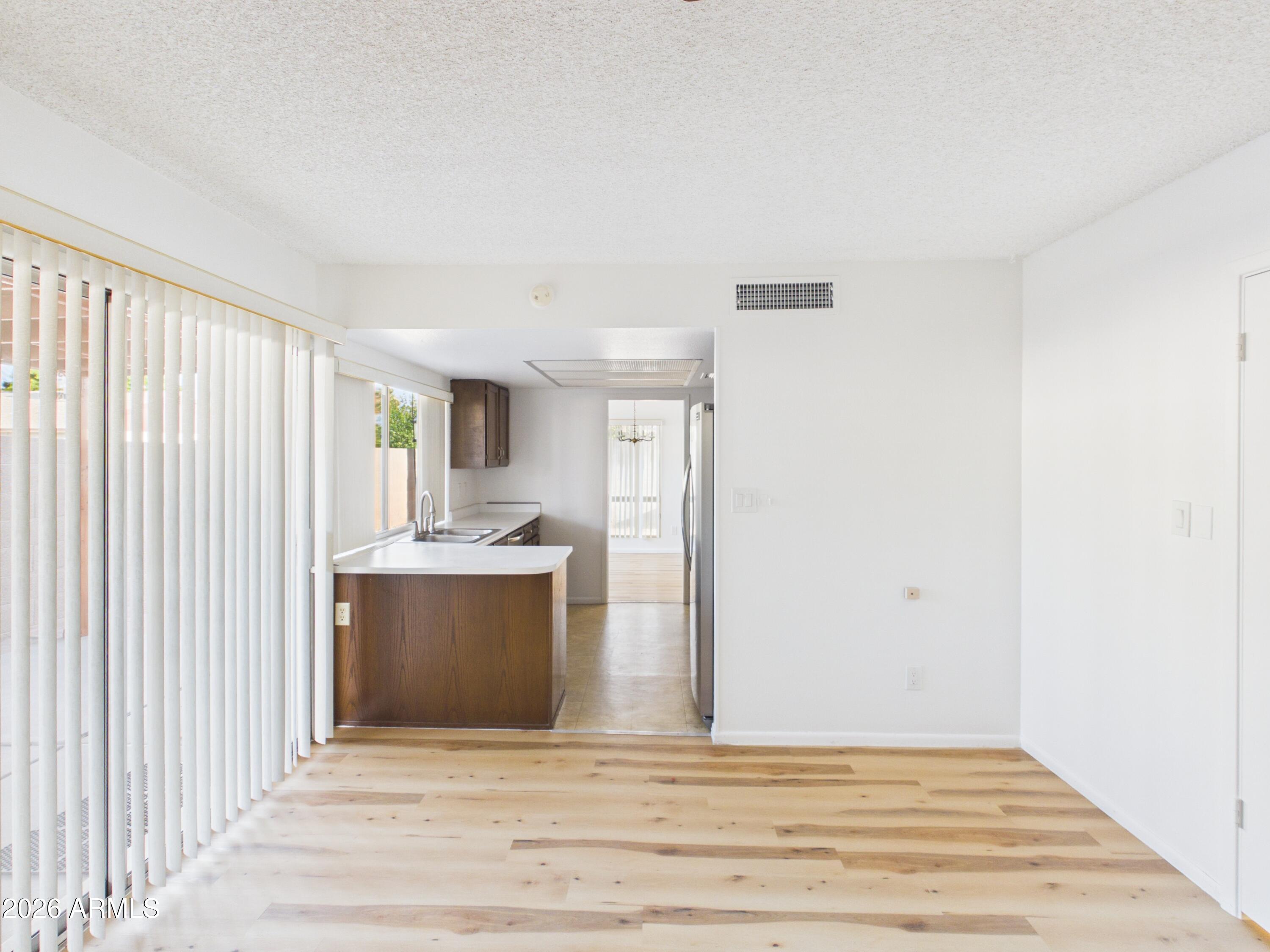4033 West Griswold Road Phoenix, AZ 85051 - Photo 8 of 45 CAM04435G0-PR0020-STILL001