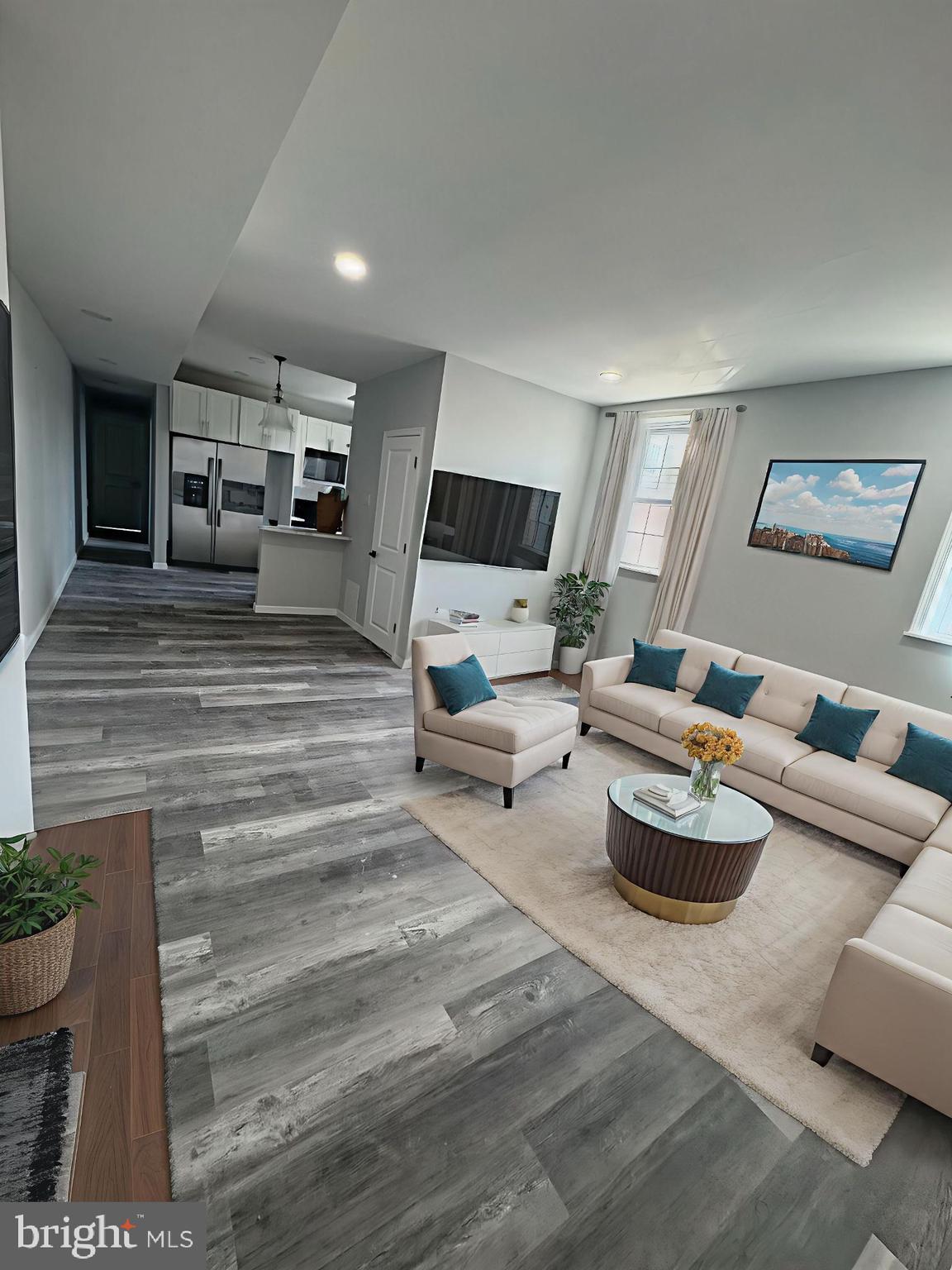 1850 South 23rd Street Philadelphia, PA 19145 - Photo 1 of 10 a living room with furniture and a flat screen tv
