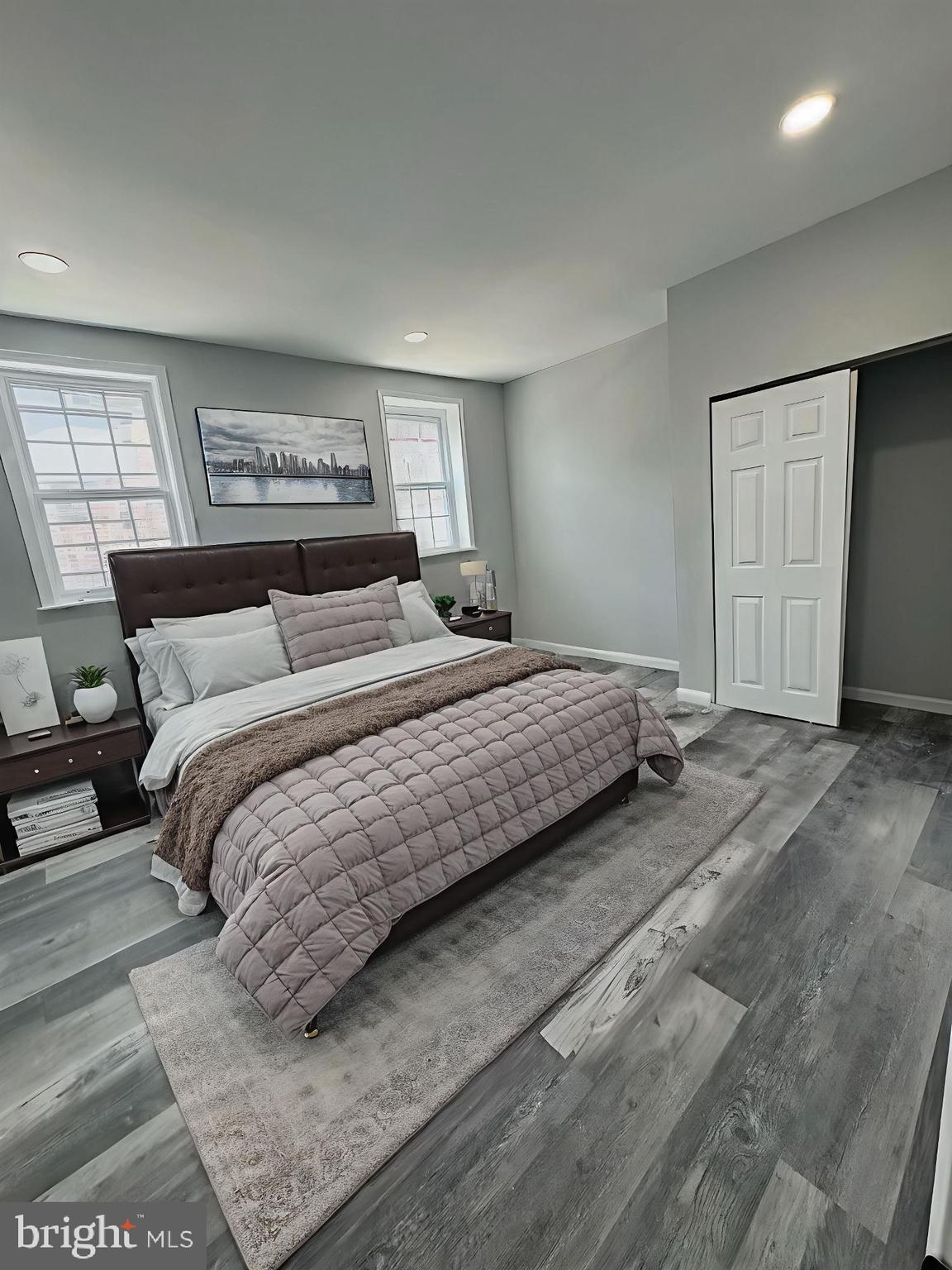 1850 South 23rd Street Philadelphia, PA 19145 - Photo 2 of 10 a bedroom with a bed and a window