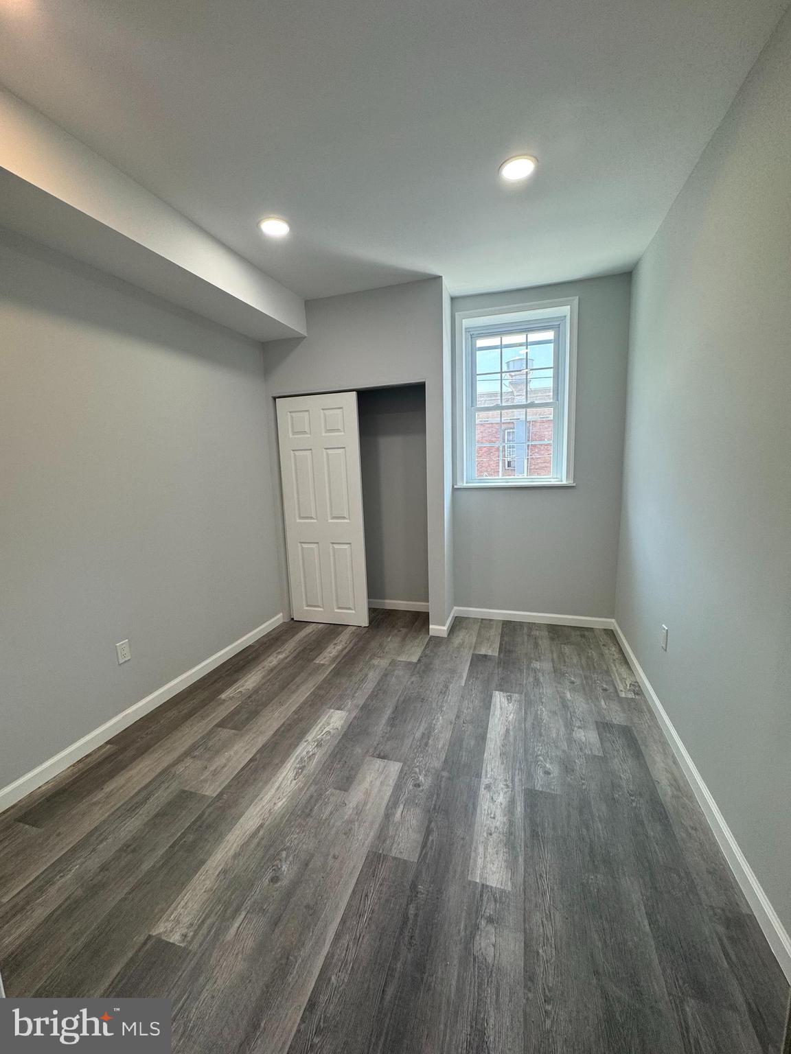 1850 South 23rd Street Philadelphia, PA 19145 - Photo 6 of 10 a view of a room with wooden floor and window